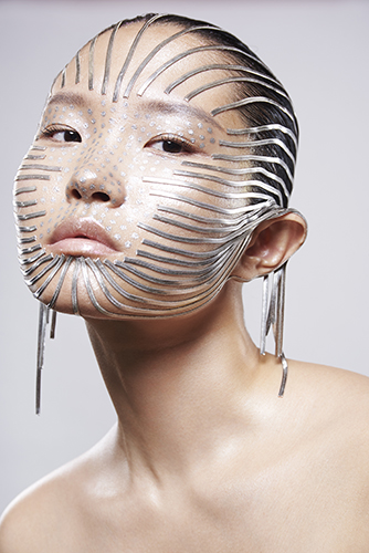 Photo de beauté en studio makeup créatif sur mannequin asiatique